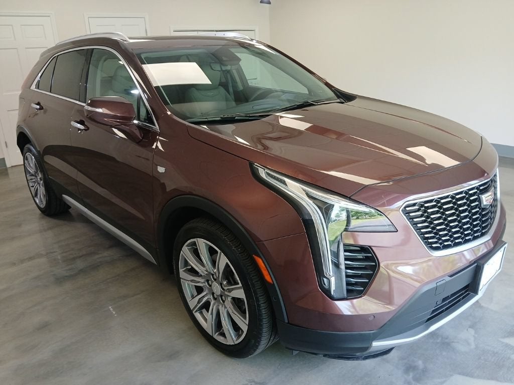 2022 Cadillac XT4 Premium Luxury in Rosewood Metallic — front three-quarter view