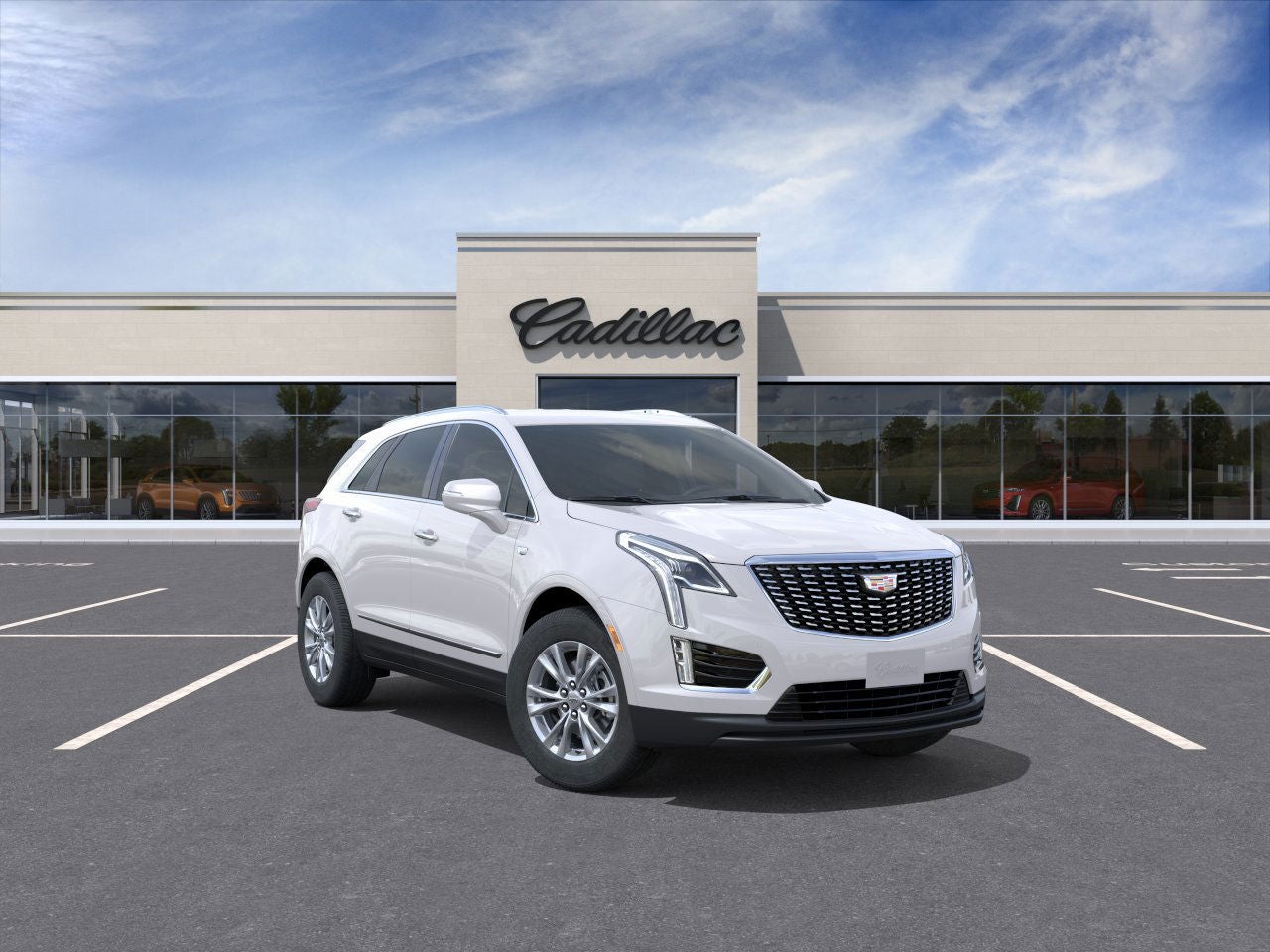 2026 Cadillac XT5 Luxury in Crystal White Tricoat — front three-quarter view