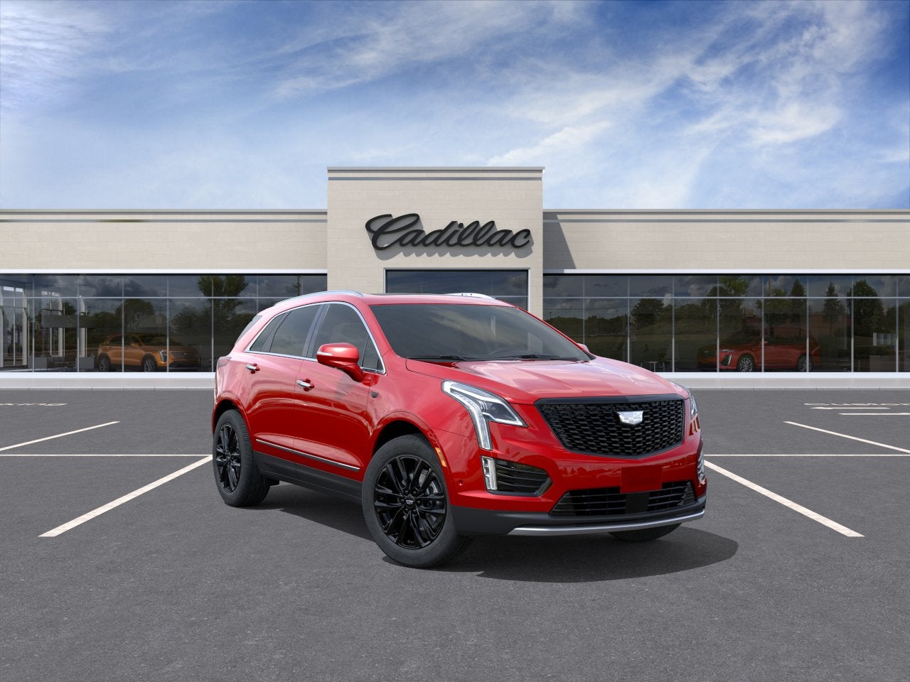 2026 Cadillac XT5 Premium Luxury in Radiant Red Tintcoat — front three-quarter view