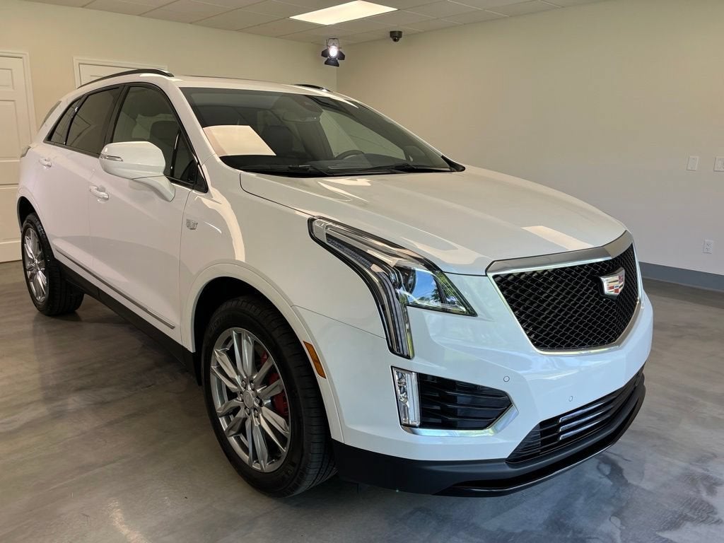 2025 Cadillac XT5 Sport in Crystal White Tricoat — front three-quarter view