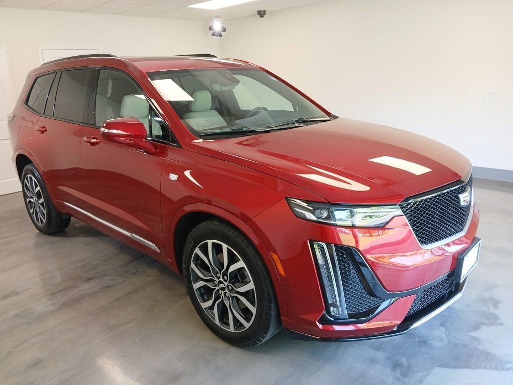 2021 Cadillac XT6 Sport in Infrared Tintcoat — front three-quarter view