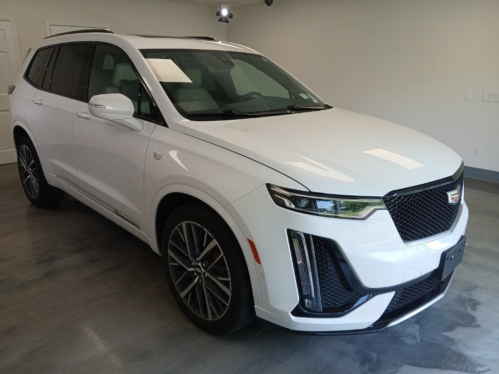 2024 Cadillac XT6 Sport in Crystal White Tricoat — front three-quarter view