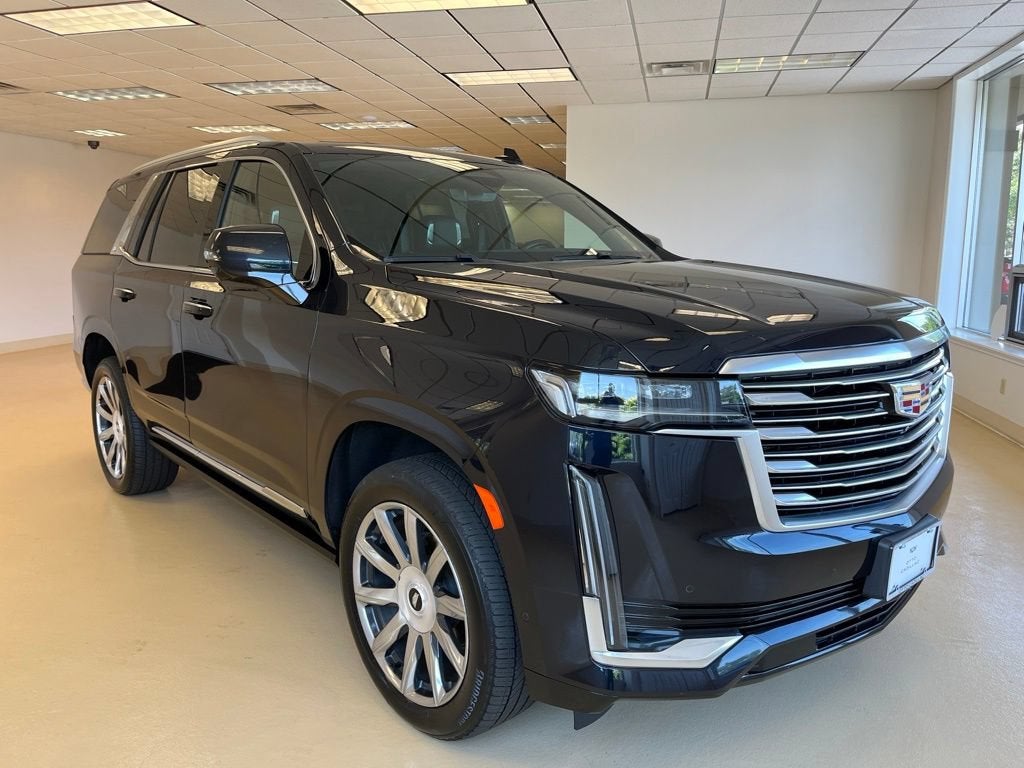 2023 Cadillac Escalade Premium Luxury Platinum in Dark Moon Blue Metallic — front three-quarter view