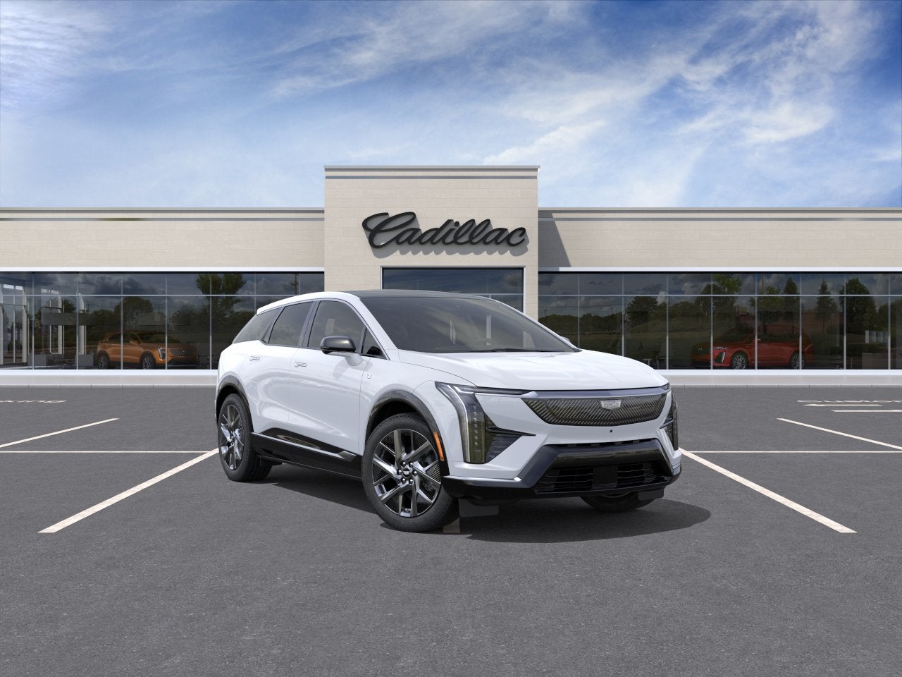 2026 Cadillac OPTIQ Luxury in Vibrant White Tricoat — front three-quarter view