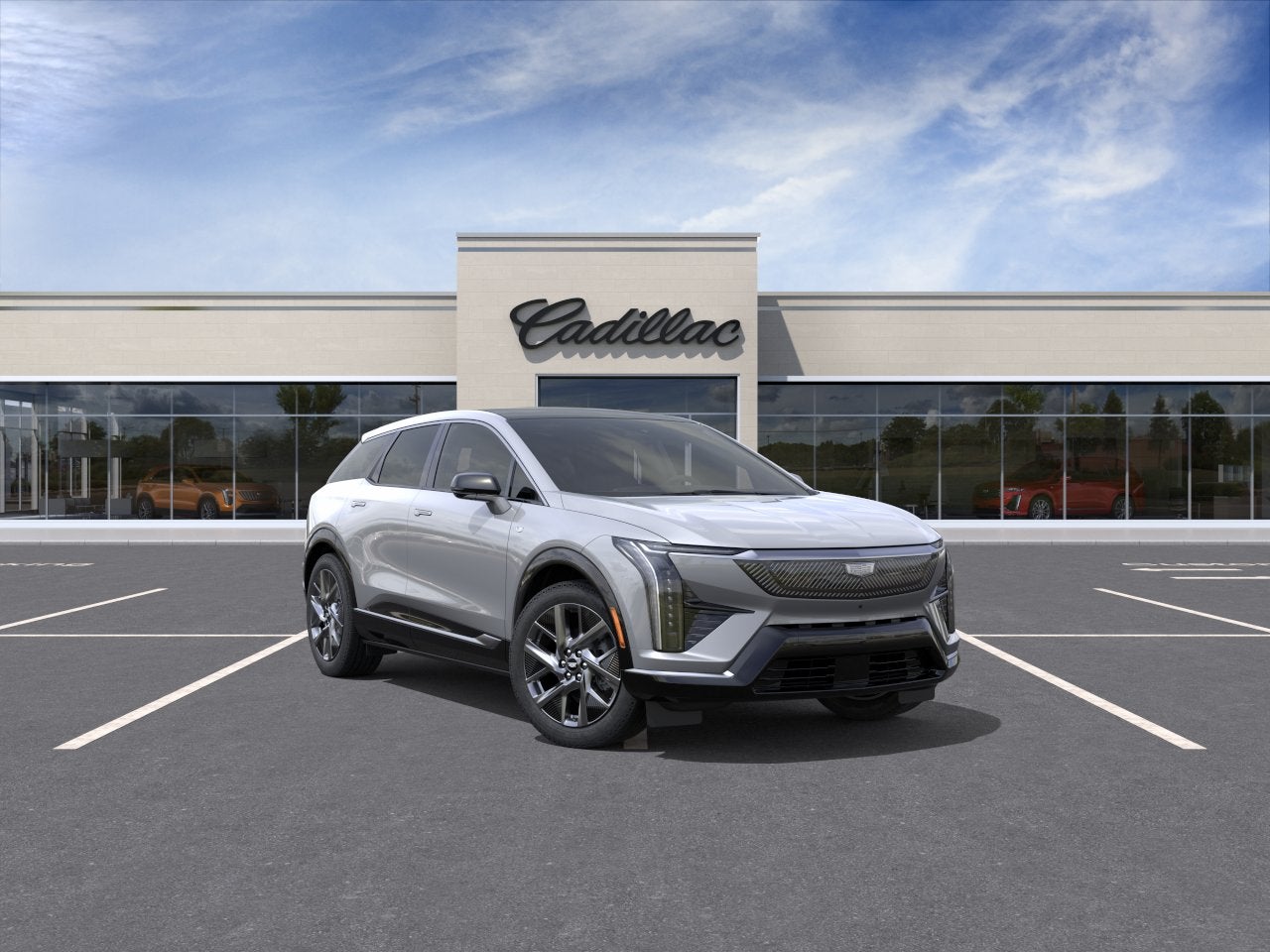 2026 Cadillac OPTIQ Luxury in Argent Silver Metallic — front three-quarter view