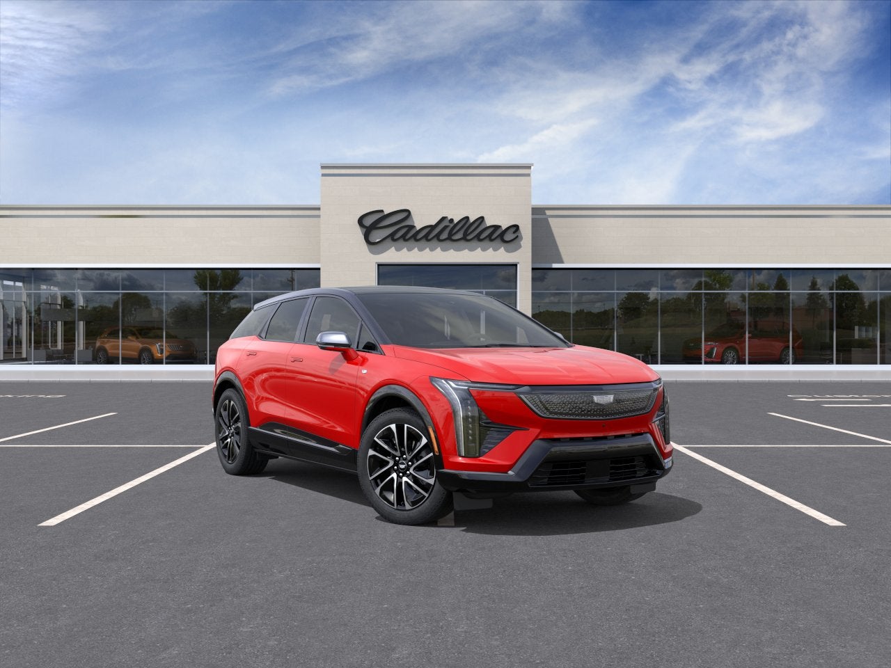 2026 Cadillac OPTIQ Sport in Monarch Orange — front three-quarter view