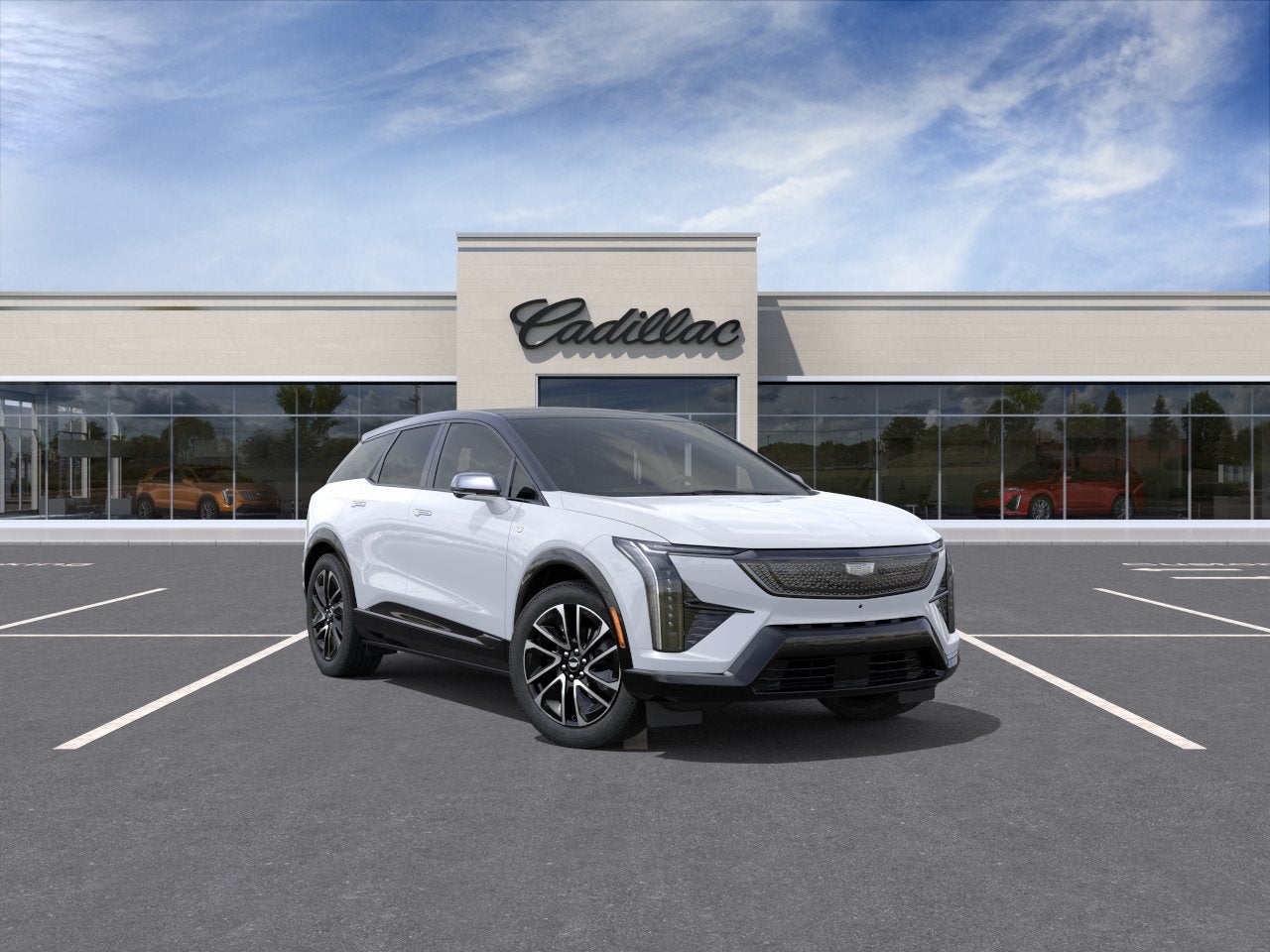 2026 Cadillac OPTIQ Sport in Vibrant White Tricoat — front three-quarter view